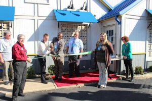 Rockford leaders celebrate the opening of a new Long John Silver's near the new low-income housing development project on the East Side.
